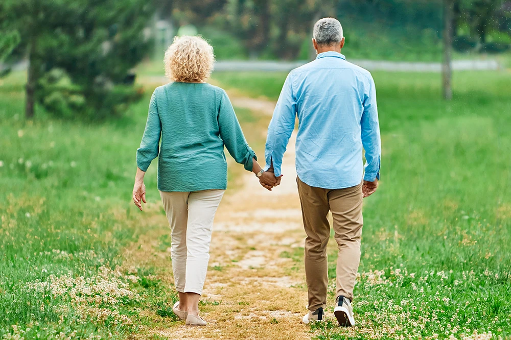 couple walking hand in hand